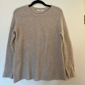 Madewell sweater with two small holes.